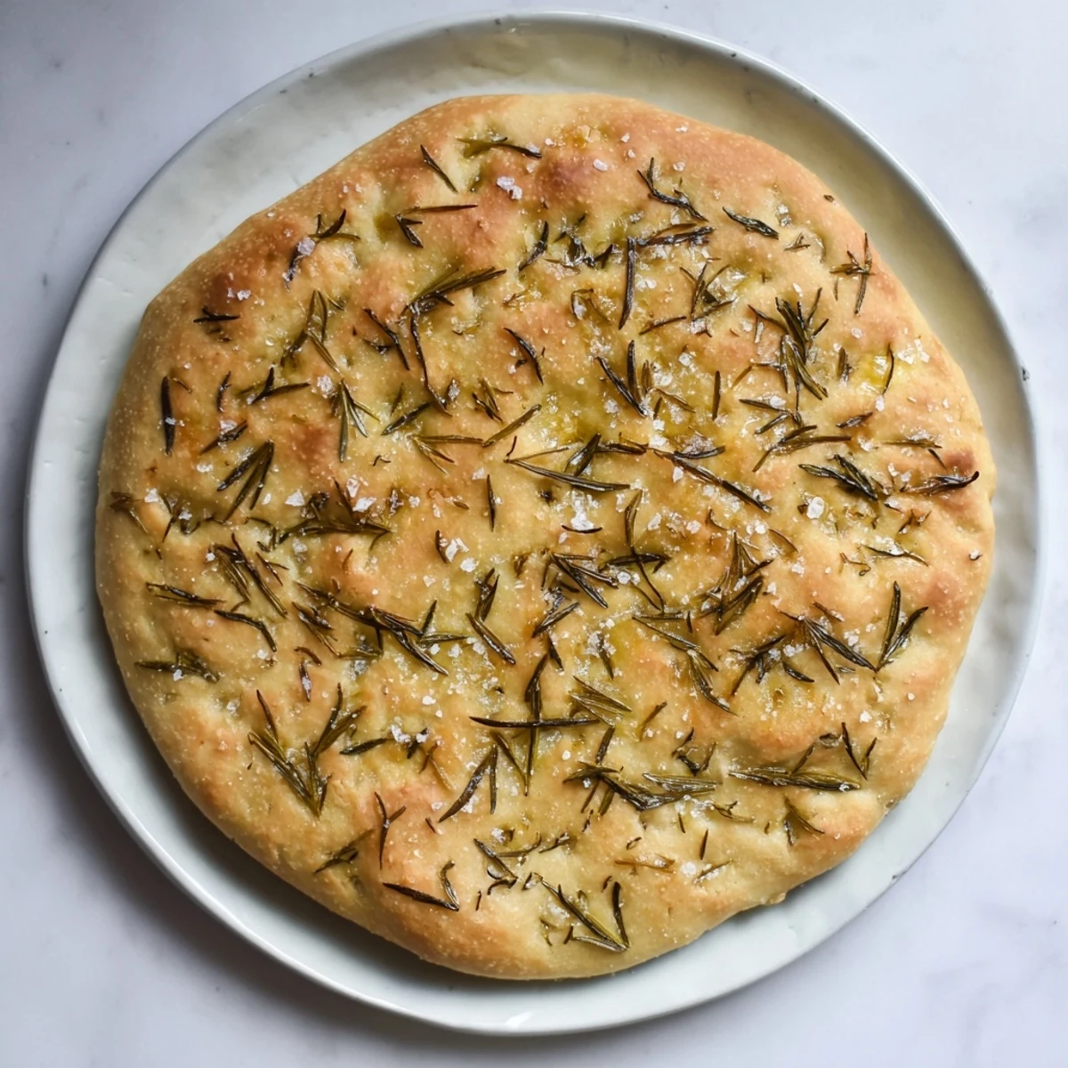 Quick Homemade Flatbread with rosemary and sea salt, a warm and golden flatbread ready to be enjoyed.