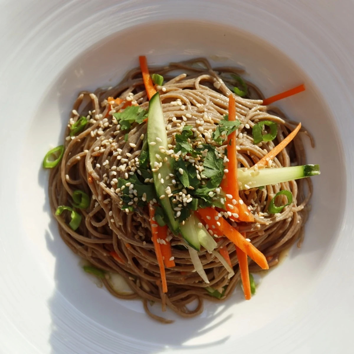 Chilled Noodle Lunch Cups with vibrant veggies, drizzled in savory sauce, perfect for a refreshing lunch.