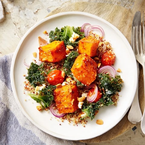 Golden Honey-Roasted Butternut Squash Bowl, featuring glistening, caramelized squash atop quinoa and fresh greens.