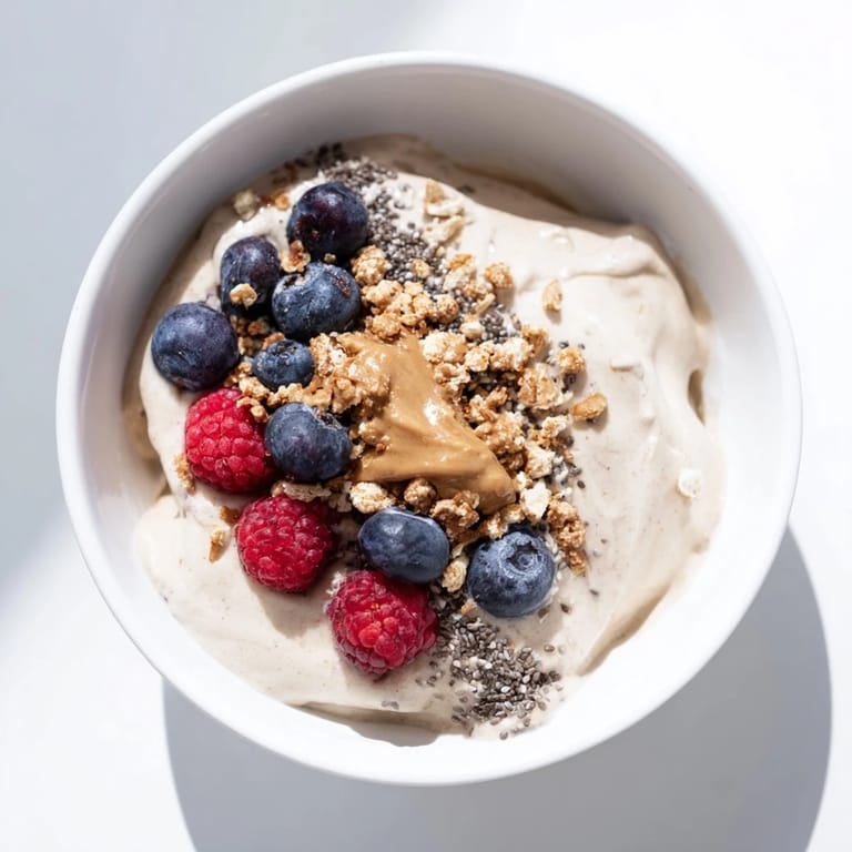 Healthy and delicious protein ice cream bowls, featuring a frozen banana base, ready to eat.