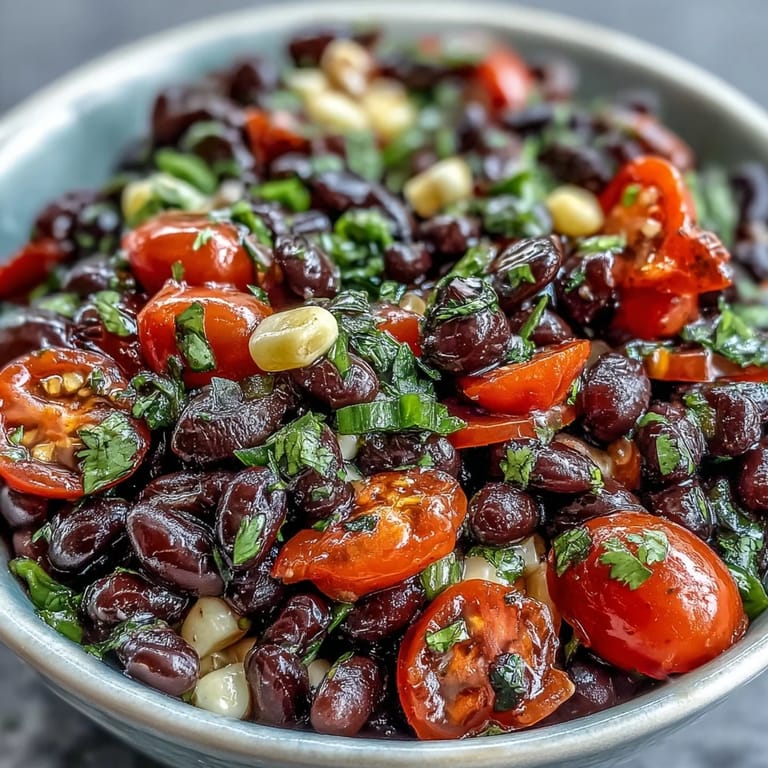 Hearty Cowboy Caviar served in a rustic bowl, perfect for dipping chips or as a zesty side for grilled meats.